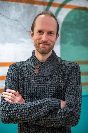 A portrait photograph of Chris Rodgers