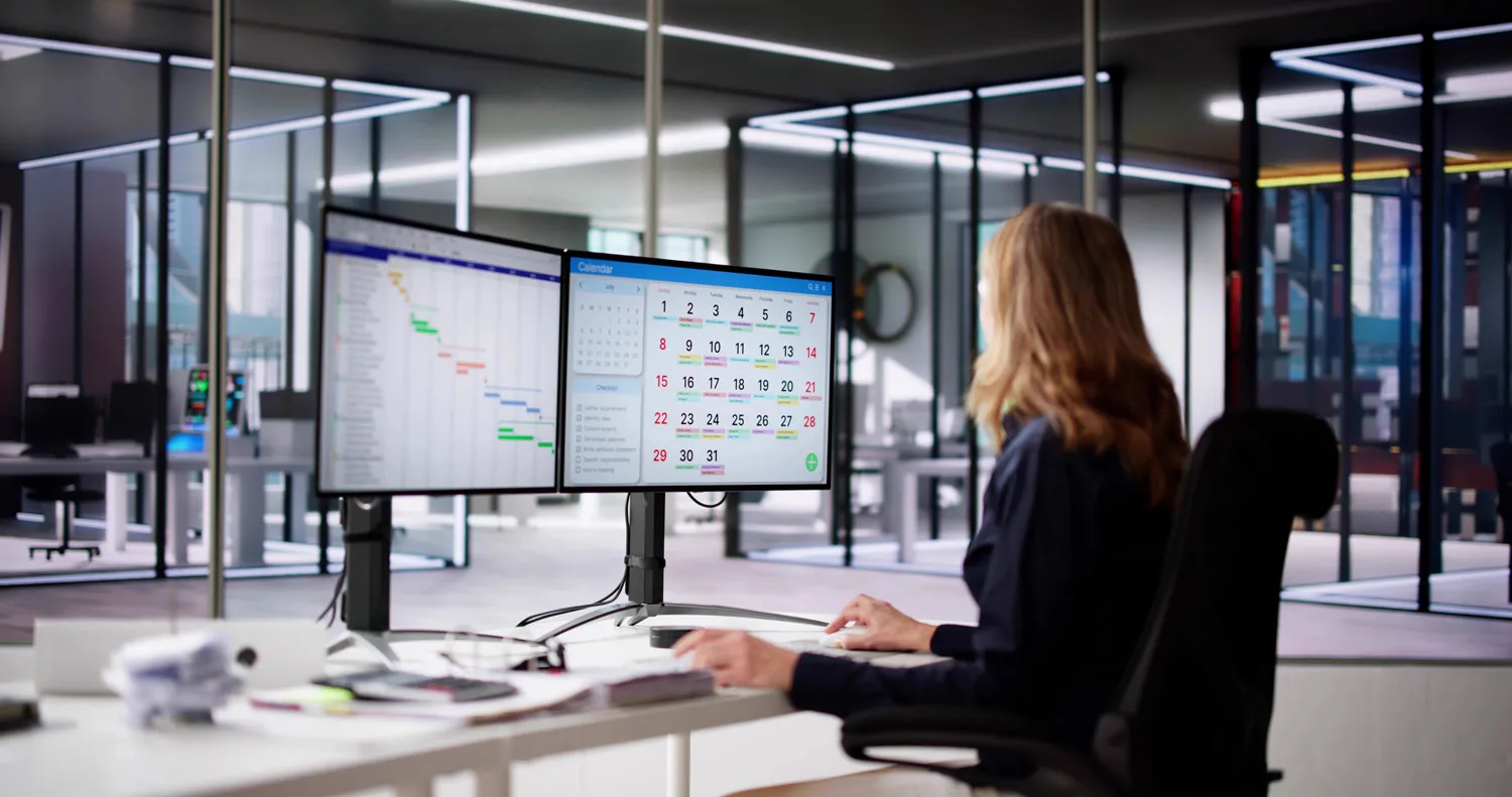 a business administrator managing an employee calendar