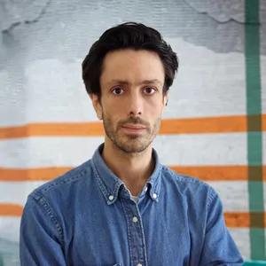 A portrait photograph of Ben Osborn-Macpherson